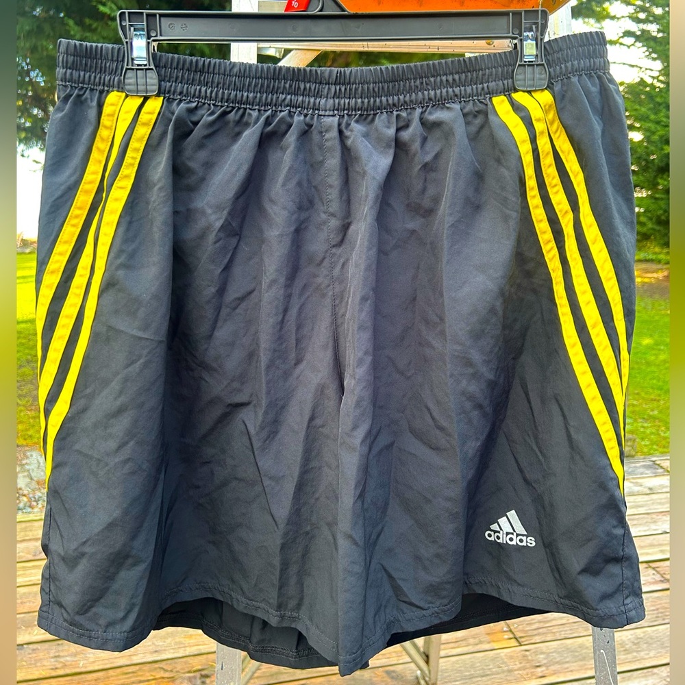 Men’s athletic adidas’s black shorts with yellow strips